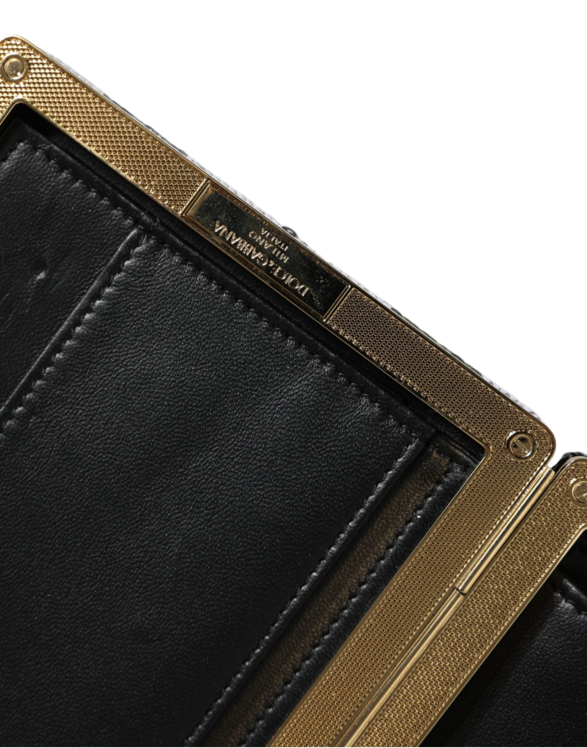 Pochette de soirée Dolce & Gabbana noire et dorée avec cadre blanc