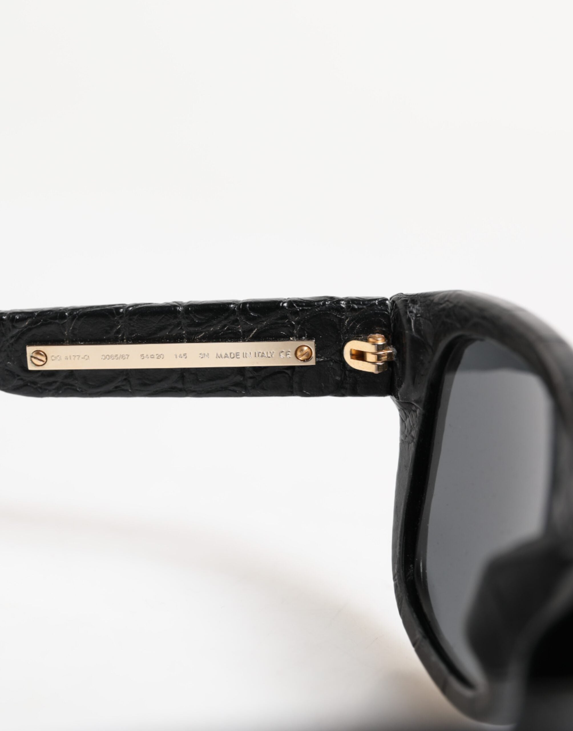 Dolce & Gabbana DG4177 Zwart Leren Montuur Getinte Glazen Zonnebril